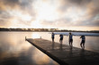 © Wavebreak Media - Female rowing team training on a river