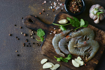 Wall Mural - raw shrimp on a dark background