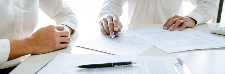 real estate agent broker or house developer showing contract for buying house agreement to consultan