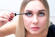 © Евгения Медведева - Woman mascara applying brush, female portrait makeup eyelashes