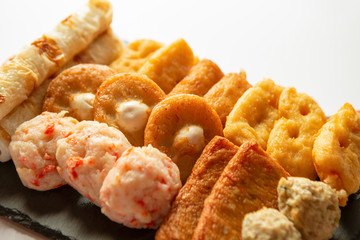 Japanese assorted fish cakes on white background 