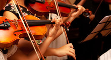 Row, Group Of Anonymous Violin Players, Children, People Playing, Bows In Hands, Stands In Front, Closeup. Classical Music Concert Simple Performance Kids Orchestra String Section / Quartet Performing