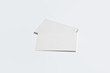 © sabir - Business Cards Mock-up fan stack at white textured paper background.High resolution photo.