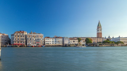 Wall Mural - View of the Campanile di San Marco and Palazzo Giustinian, from San Giorgio Maggiore timelapse, Venice, Italy.