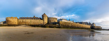 Saint Malo Cityscape Or Skyline At Dusk. Medieval Ramparts Surrounding The Historic Town From Plage De L'Eventail Panoramic Scenery, Brittany, France.