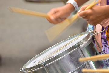 Women playing drums at the brazilian carnival