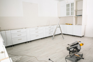 Poster - Stylish kitchen interior with newly installed furniture