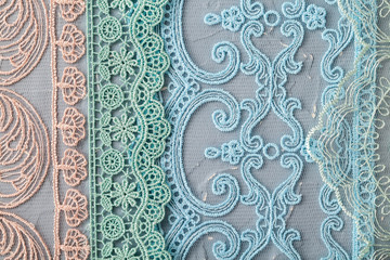  Beautiful laces on a shabby background, a textile product with an ornamental design, light transparent mesh patterned fabric