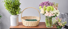Education In The School Of Floristry. Master Class On Making Bouquets. Summer Bouquet In A Wicker Basket.. Learning Flower Arranging, Making Beautiful Bouquets With Your Own Hands. Flowers Delivery