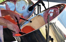 Playing Steel Drums At Art Festival