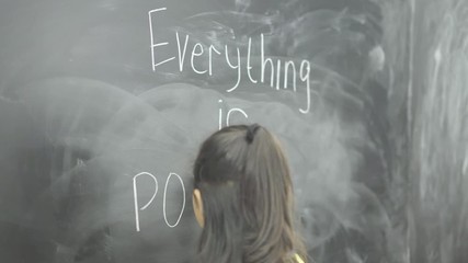 Wall Mural - Female student writes text of Everything is Possible