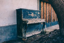 The Old Piano Standing In The Street
