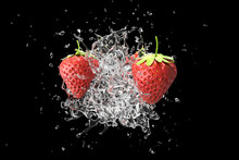 Explosion Liquid Water With Strawberry Fruit On Black Background. 3D Render.