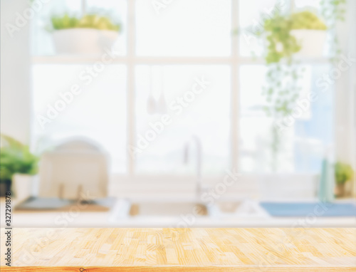Fotomural Wood table top on blurred kitchen background