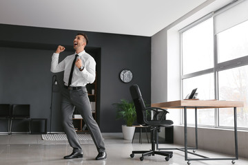 Poster - Young businessman dancing in office