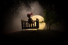 Old Creepy Eerie Wooden Baby Crib In Dark Toned Foggy Background. Horror Concept. Scary Baby And Bed Silhouette In Dark. Halloween Decoration Shot. Selective Focus