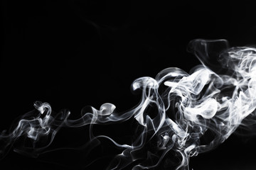 White smoke on a black background