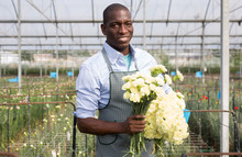 African American Man With  Bouquet Of Fresh Cut Carnation Flowers