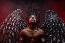 Portrait Of Reckless Dark Angel With Strong Muscles, Having Athletic Body, African Man In The Flesh Of Dark Angel Illustrate Falling From Heaven, Angel Wants To Give People The Right Decision