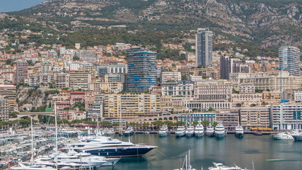 Wall Mural - Monte Carlo city aerial panorama timelapse. View of luxury yachts and apartments in harbor of Monaco, Cote d'Azur.