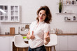 © romaset - Young girl sorting garbage at the kitchen. Concept of recycling. Zero waste
