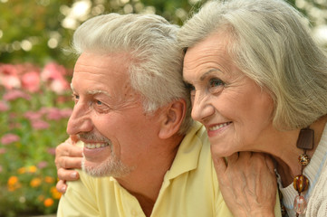 Canvas Print - Beautiful caucasian senior couple in the park