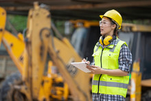 A Asian Girl Construction Engineer At Construction Site 