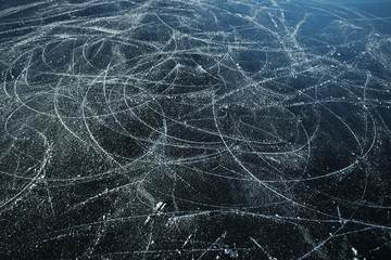 Wall Mural - ice traces of skates texture, abstract background, top view aerial photography traces of hockey skates