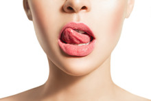 Woman's Tongue Seductively Licking Lips. Beautiful Chubby Lips. Seduction Concept