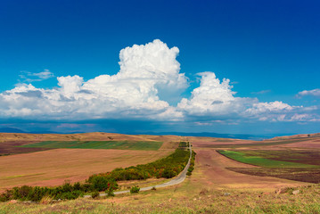 Georgian steppe landscape on the way East from Tbilisi to the monastery complex David Gareji.