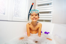 Little Cute Boy Sit In The Bathtub Wear Snorkeling Mask And Scuba Smiling Play With Soap Waiting Sea Summer Vacations