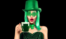 St. Patrick's Day Leprechaun Laughing Model Girl Holding Green Beer Pint, Isolated On Black Background.  Shamrock Leaf Accessories. Celebrating Patrick Day Pub Party. Surprised Young Woman In Costume