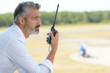 man with a walkie talkie