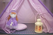 © Yekatseryna - Decorative boho style cozy hut with decor. Cozy Wigwam with toys.