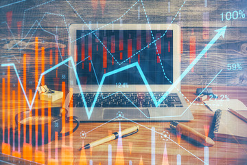 Double exposure of forex graph and work space with computer. Concept of international online trading.