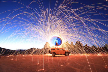 Wall Mural - Night Creative Light Painting With Steel Wool Lighting