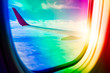 © Chan2545 - Equality LGBT gay legal rights on airplanes freedom to travel happy journey holidays vacation on flight for summer tip in pride month to festivals. Background of airline wing sky and window frame