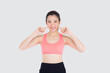 © NT_studio - Beautiful portrait young asian woman in sport touch cheek with satisfied and confident isolated on white background, asia girl cheerful have shape and wellness, exercise for fit with health concept.