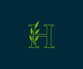 Initial H letter with green leaves logo Icon.