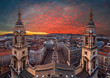 Budapest, Hungary - Amazing dramatic sunset over Budapest taken from the top of St.Stephen's Basilica. The view includes two towers of basilica, St.Stephen's Square, Buda Castle & Zrinyi street