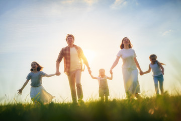 Wall Mural - Happy family on summer walk