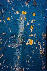 Sticker - metal surface is covered with crumbling blue paint.