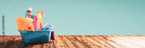 Cuadros en Lienzo Cleaning items in a basin on a wooden table web banner with copy space: spring c