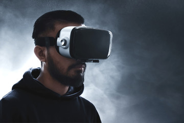 Wall Mural - Man wearing virtual reality headset