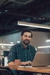 © shevchukandrey - Young office worker being in good mood stock photo