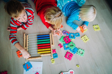 Wall Mural - kids learning numbers, abacus calculation, education concept