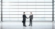 © Who is Danny - Businessmen shaking hands in modern interior