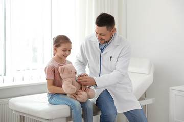 Sticker - Children's doctor working with little patient in clinic