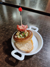Mushroom Cap With Bacon Punctured On A Stick On Bread