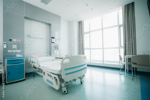 Recovery Room with beds and comfortable medical. Interior of an empty hospital room. Clean and empty room with a bed in the new medical center